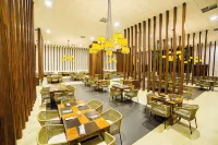 Taua Hotel e Convention Alexania - 朝食