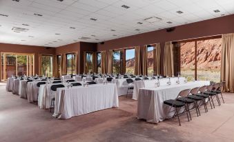 a large conference room with multiple tables and chairs set up for a meeting or event at Nayara Alto Atacama