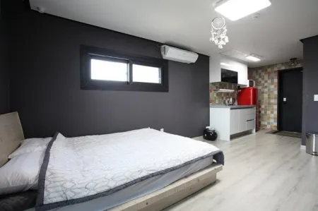 Jeju Sanammae House Pension Отели рядом с достопримечательностью «Dangcheomuldonggul Cave»