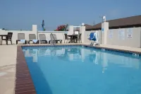 Port Isla Inn - Moteles