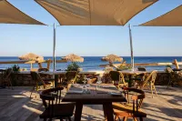 Sea Breeze Santorini Beach Resort, Curio Collection by Hilton Hotels in Thira