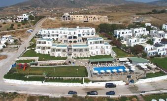 aerial view of a resort with multiple buildings , including a hotel and a conference center , situated on a hillside at Saint George Hotel