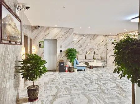 Dangxiong Four Seasons Sunshine Boutique Hotel Отели рядом с достопримечательностью «Народный конгресс Наму»