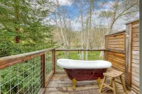 Riverfront cottage w/ hot tub, lush gardens, privacy & river access, pets ok!