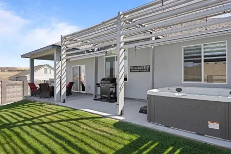 New house! Hot Tub and fire-pit waiting for you.