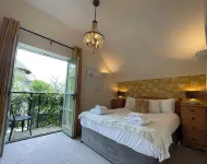 Cosy Cottage for Family Fun with Log-Burner, Spa, Private Parking, EV & Pools