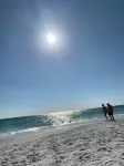 TOTAL BEACH VIBE with additional amenities for that perfect getaway.