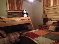 Just steps away from Rainbow Lake in this Dog Friendly Cabin