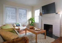 The Hideaway, a cozy historic cottage tucked away in the heart of downtown WPB!