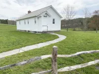 19th century school house converted into a charming two story dwelling
