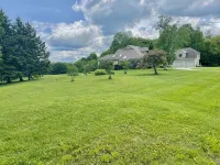 Enjoy Every Season at this Serene Estate with Incredible Mountain Views !