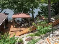 Single level home in a gentle, quiet , deep water cove  at Lake of the Ozarks .