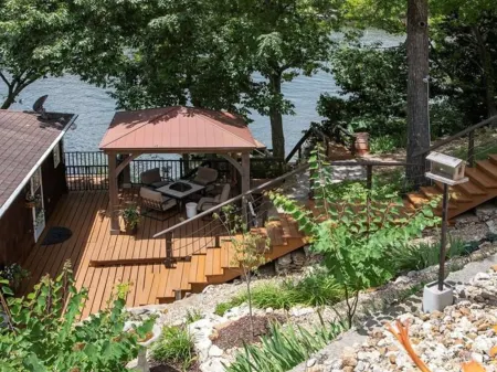 Single level home in a gentle, quiet , deep water cove  at Lake of the Ozarks .