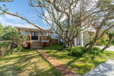 Paradise Found! Just steps to the sand with this Villa on Vilano Beach.