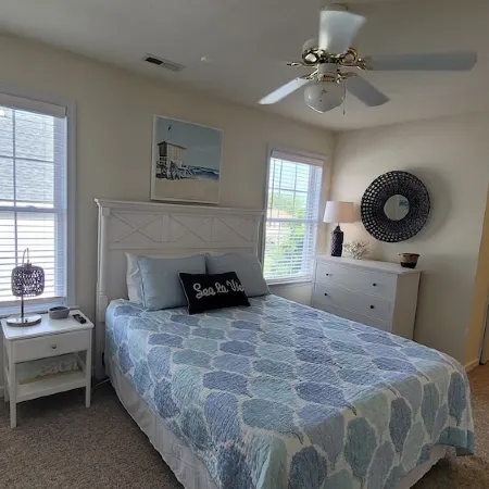 Pet Friendly Home with Private Tiki Bar - 3-minute drive to the beach!