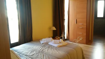 Apartamentos Turísticos la Garza فنادق في Casar de Caceres