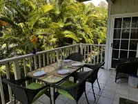 Tropical Gardens and Serene Community Amenities - Charming Island Retreat