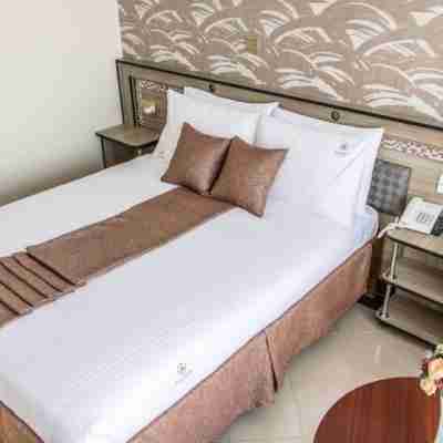 Astorian Grand Hotel Rooms