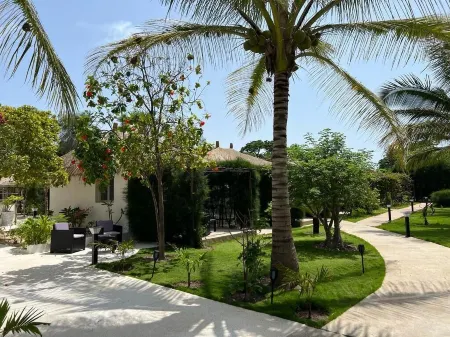 Keur Papaye Отели в г. Фундиунь