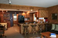 The Bunkalow Lakefront Compound w Lifts for Your Speed Boat & Tritoon