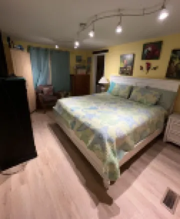 “Tiki time Getaway” -dog friendly, sleeps 6. Corner of splash pad and pool.