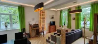 Modern apartment with fireplace, e-charging station and free parking space