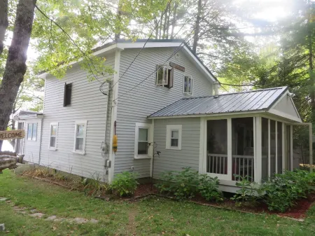 Screen Porch with see thru roof, BQ, 30' from sandy beach,  canoe and 3 kayaks