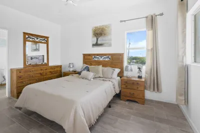 Cozy two-bedroom two bathroom on white sandy beach