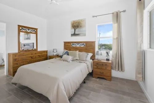 Cozy two-bedroom two bathroom on white sandy beach