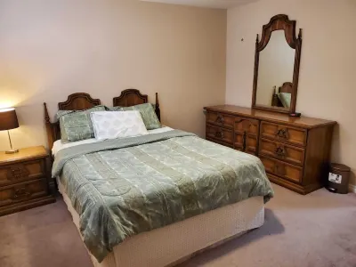 Contemporary & Cheerful 1-Bedroom Suite with Fireplace Hotels in Southeast Edmonton