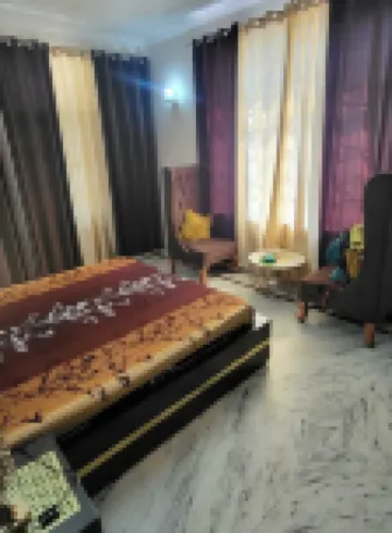 Tranquil Riverside Elegance: Luxury Retreat with Captivating Views by the Ganges