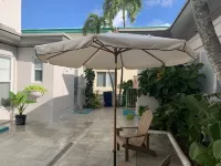 Tiana Beach Inn Hotels near Cruise terminal