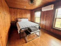 The Stone Schoolhouse - Gated Lakefront Acreage with views and historic charm