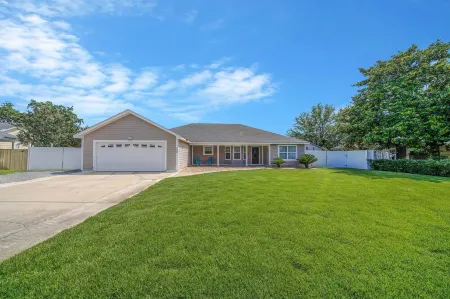 Spacious 4-bedroom house in sunny Panama City Beach with AC, WiFi, & Game Room!