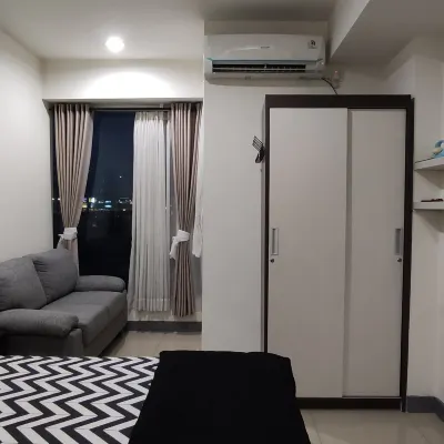 Apartement Grand Kamala Lagoon by Rebahan.id Hotels in de buurt van Patung Kuda 1 ( Satu ), Grand Galaxy City