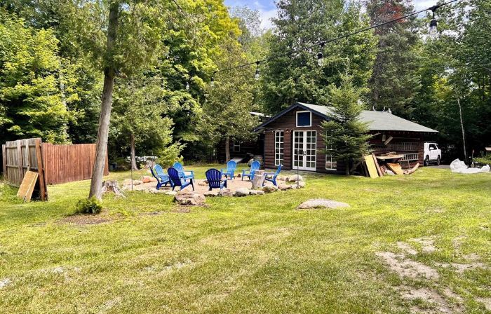 The perfect ADK log cabin getaway on 4 acres and 5 min. to town!