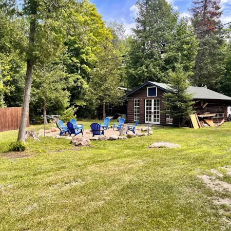 The perfect ADK log cabin getaway on 4 acres and 5 min. to town!