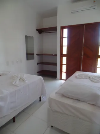 Residencial Malibu Отели рядом с достопримечательностью «Coroa Vermelha Beach»