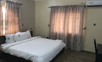 Unifirst Hotel & Suites