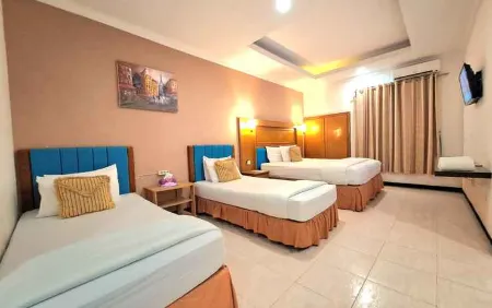 De Mawar Hotel Отели в г. Darul Imarah