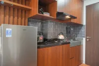 Relaxing and Homey Studio Transpark Cibubur Apartment By Travelio