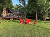 Whitefish Chain Lake Home with Beach + Sauna + King Beds + Kayaks +Paddle Boards
