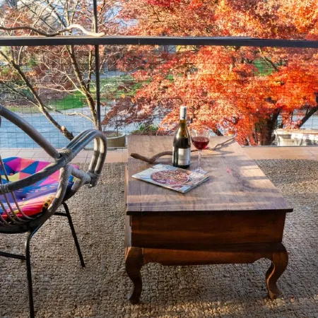 Tree Tops Apt @ Dreamers features log fire, mountain + pool views thru tree tops