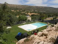 Secluded old farmhouse with a view and pool to relax in total quiet.