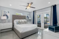 Sea Breeze Paradise - Walk to Vanderbilt Beach and Mercato, Heated Pool Home