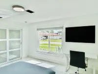 This Charming 3-bedroom house in Royal Palm Beach offers comfort and style! Hotels near Publix Super Market at The Groves at Royal Palms
