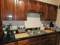Charming 2-bedroom, cozy bungalow with sunroom in fabulous St. Louis with WiFi Hotels near CVS