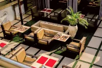 Tchetche Hotel & Restaurant Hotels near Aemo Company Limited