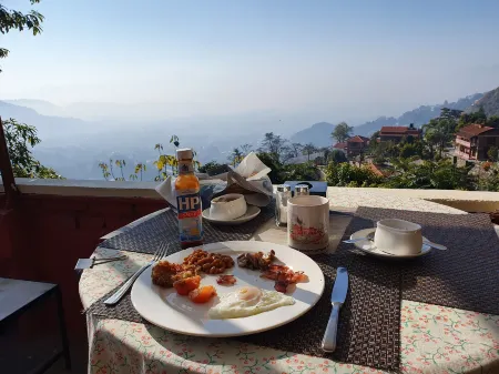 Shivapuri Heights Cottage Отели рядом с достопримечательностью «Буданилкантха Темпл»