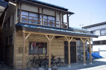 Hostel&Bar Camosiba Отели рядом с достопримечательностью «Akita Furusatomura»
